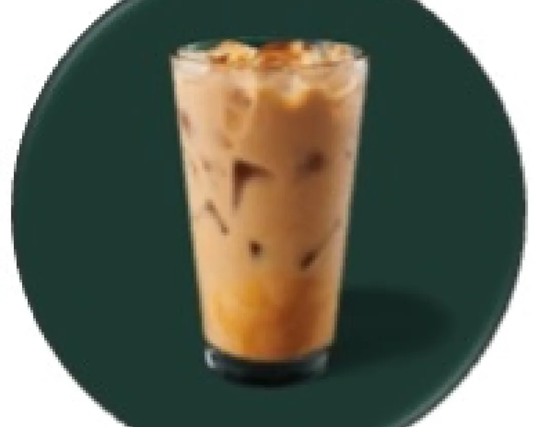 Our classic iced latte, swirling over ice