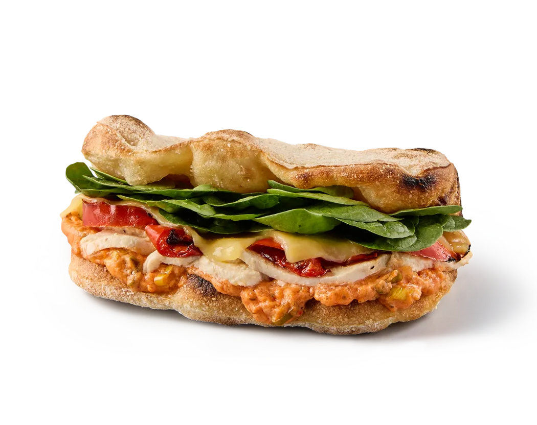 A photo of our new Buffalo Chicken Flatbread showcasing its layers of ingredients