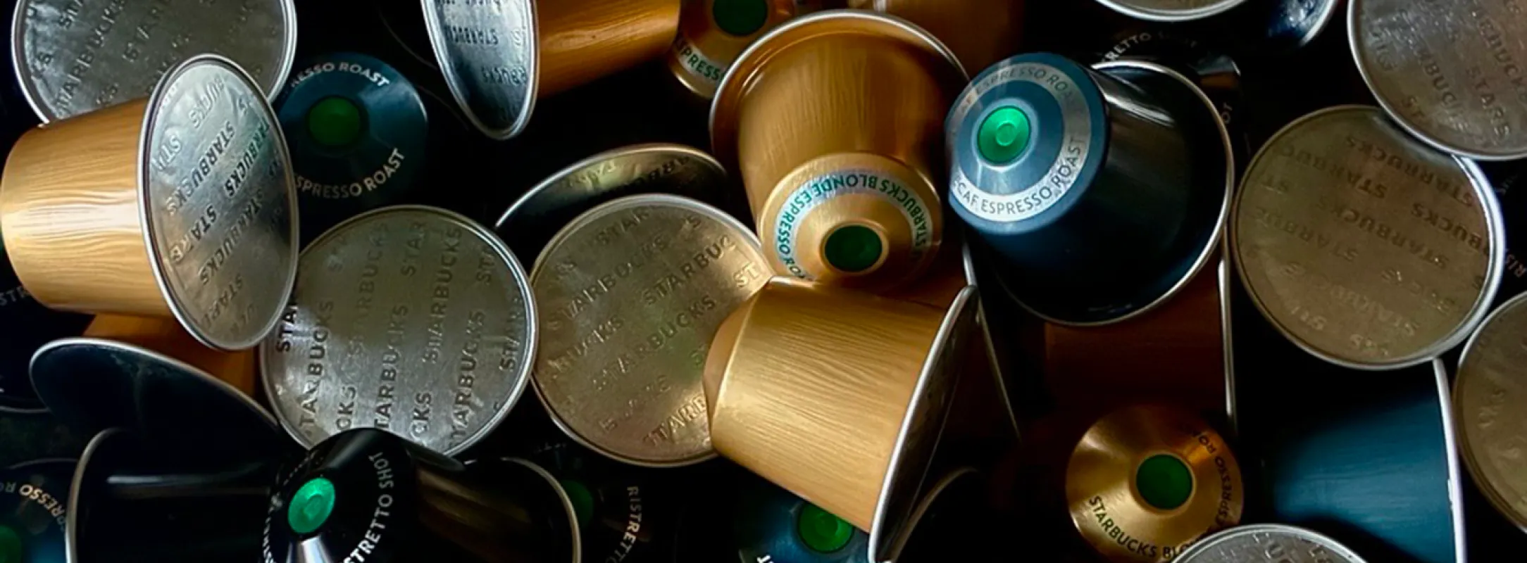 A close up image of various Starbucks® by Nespresso® pods in a pile