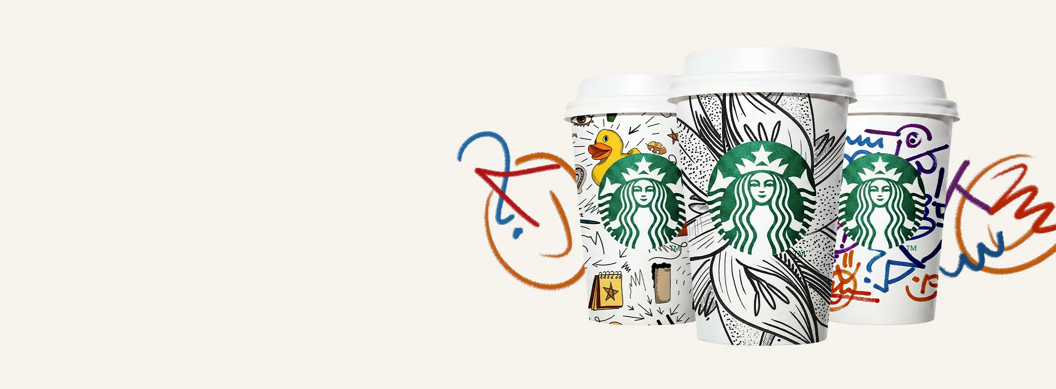 Trio of illustrated Starbucks hot cups with the doodles bleeding out to the background
