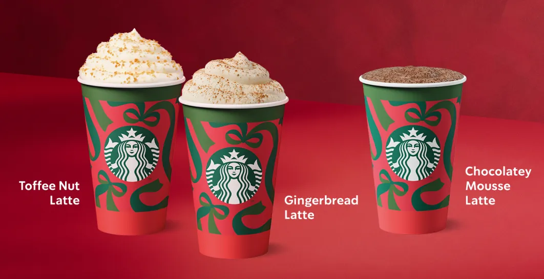 A photo of our festive Toffee Nut latte, Gingerbread Latte and new Chocolatey Mousse latte in their cheery, Red Cups